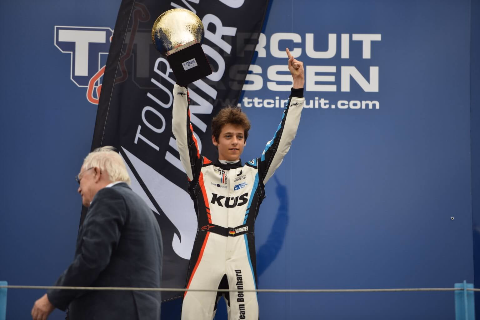 A young Daniel Gregor holding a trophy